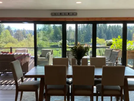 View from dining room through new Nano Door to their private lake.