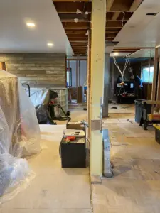 Progress view from dining towards new kitchen location.