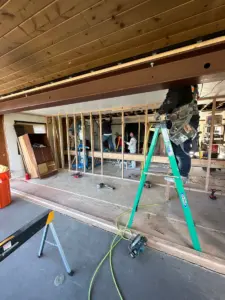 New sliding door beam support being installed.