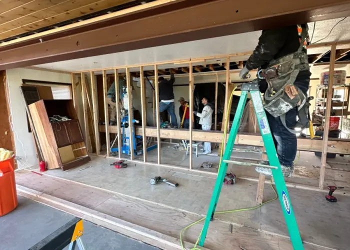 New sliding door beam support being installed.